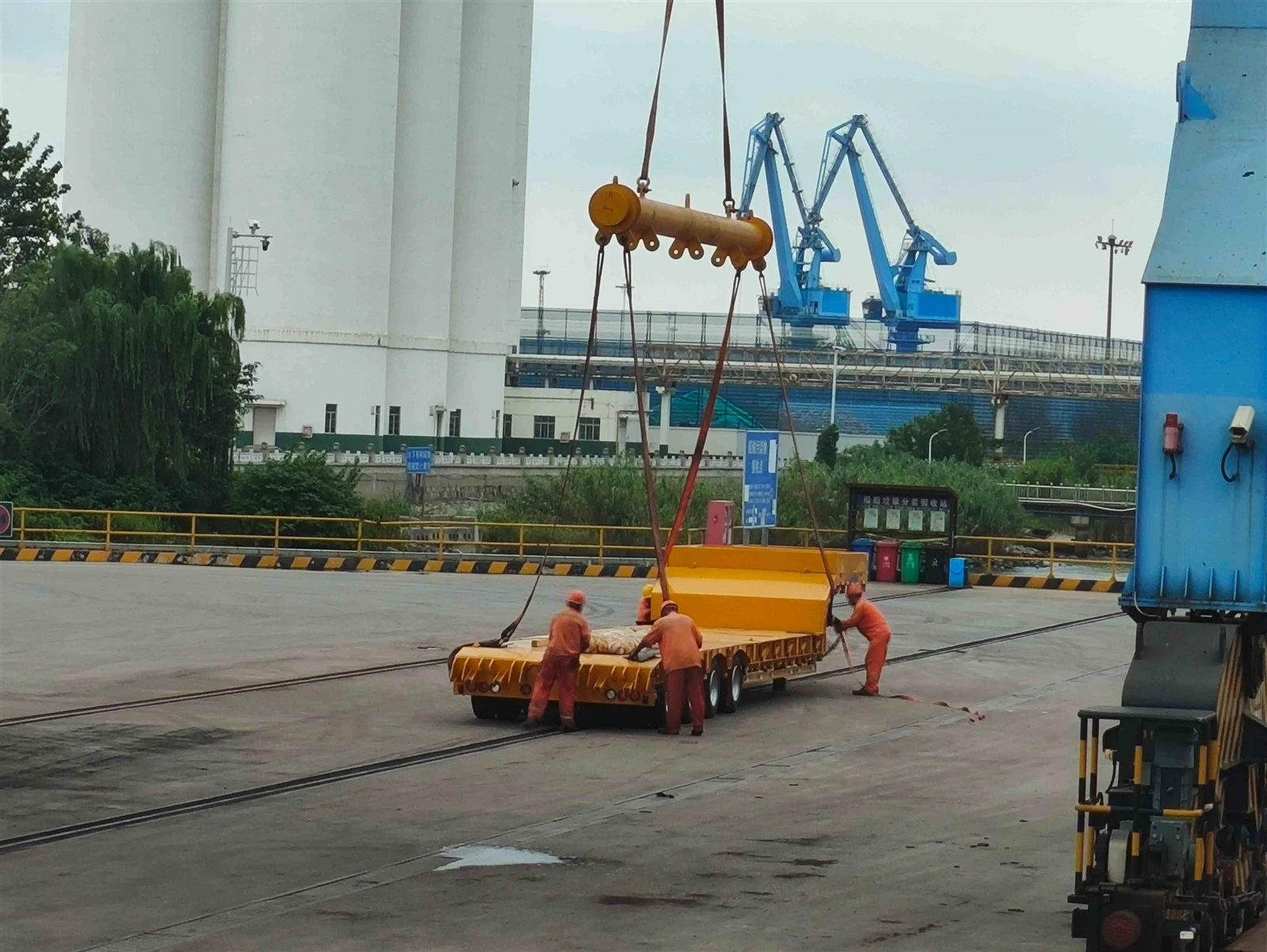 Extendable Trailer Hoisted Above Ship Deck Extendable Trailer Hoisted Above Ship Deck